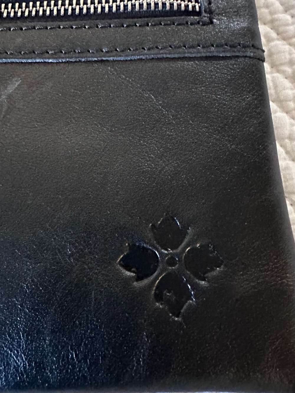 Patricia Nash Black Leather clutches with Embossed Clover Motif